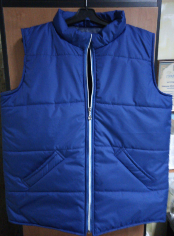 Жилет утеплений стеганый , кишені-листочки  р.48-50 - фото